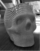 Фігурка людського черепа, надрукована на 3D принтері